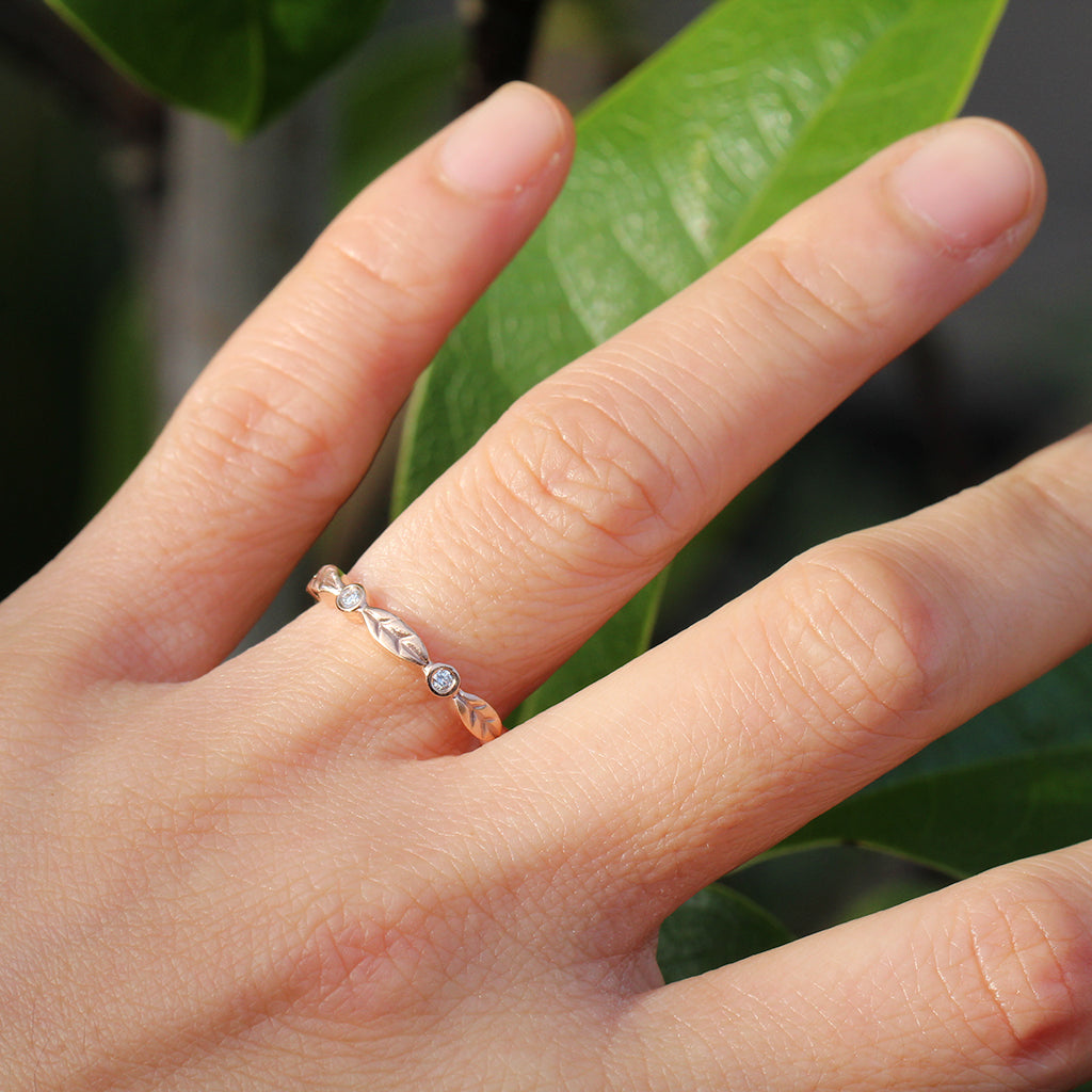 Diamond leaf wedding band in rose gold