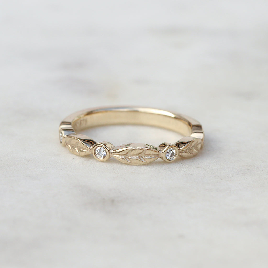 Diamond leaf wedding band in gold