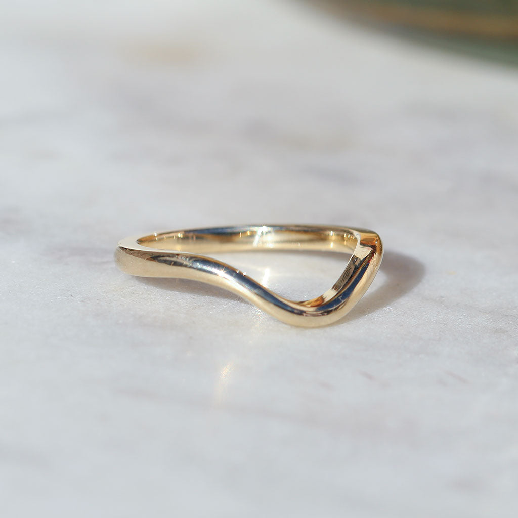 Curved wedding band