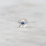Forget me not flower stud with a blue sapphire