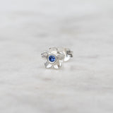 Silver forget me not flower stud with a blue sapphire