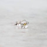 Forget me not flower stud with a yellow sapphire in sterling silver