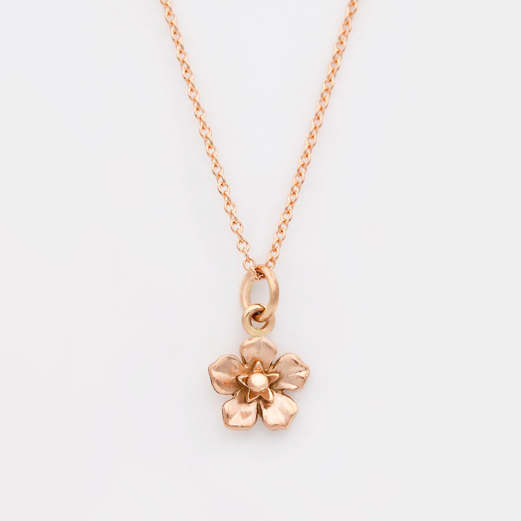 Rose gold forget me not necklace
