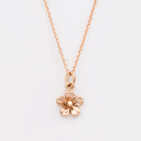 Rose gold forget me not necklace