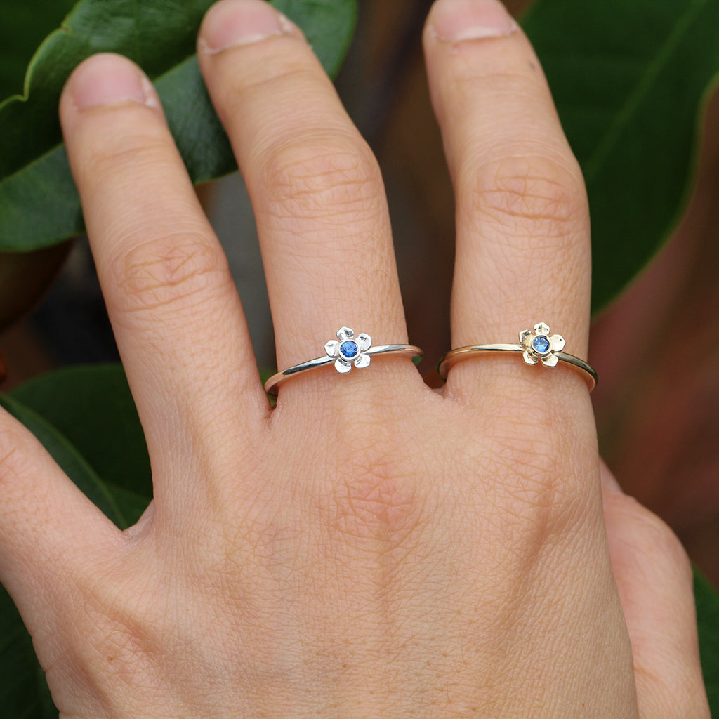 Mini forget me not flower rings with a sapphire