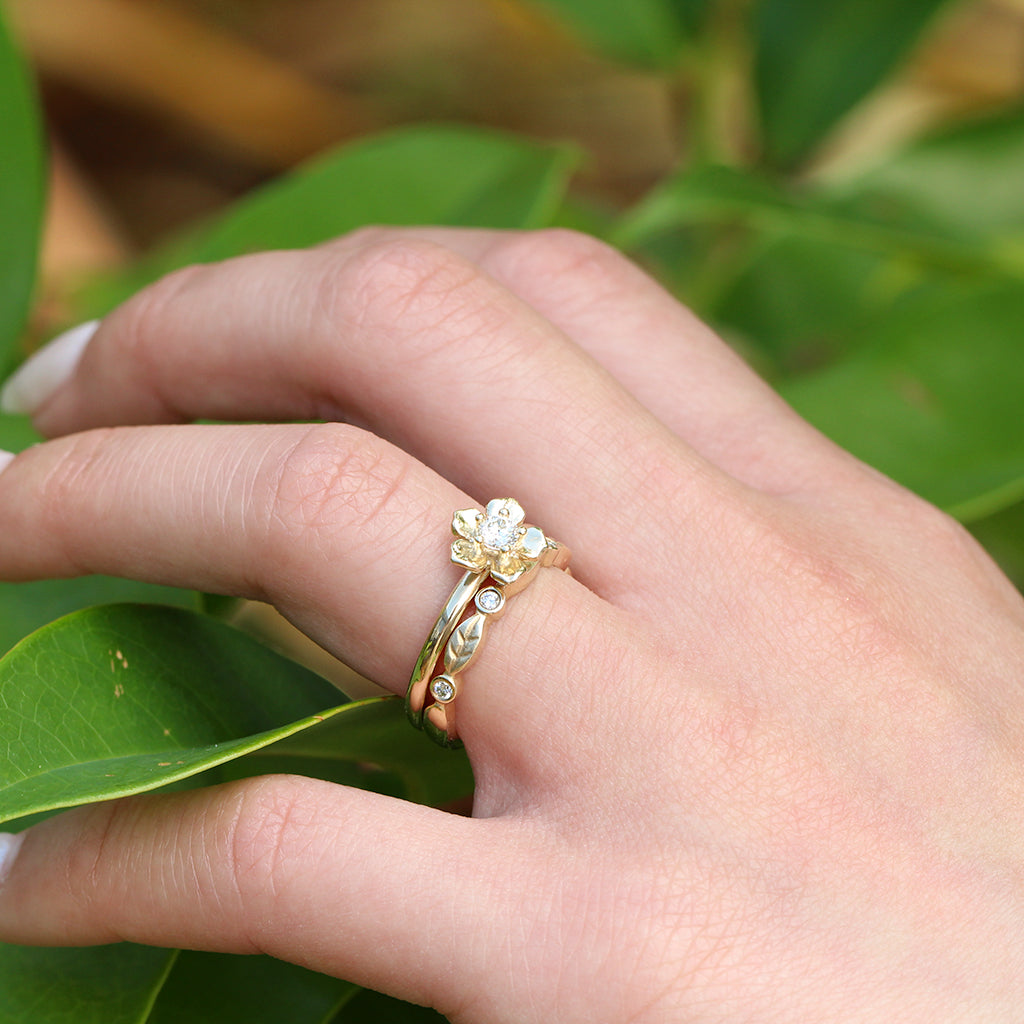 Forget me not flower engagement ring with a diamond leaf wedding ring