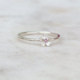 Forget me not flower ring with a pink sapphire
