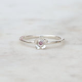 Forget me not flower ring with a pink sapphire