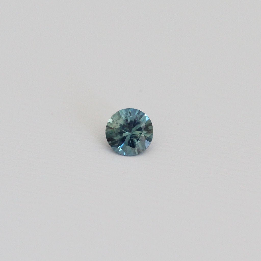 Teal green sapphire round