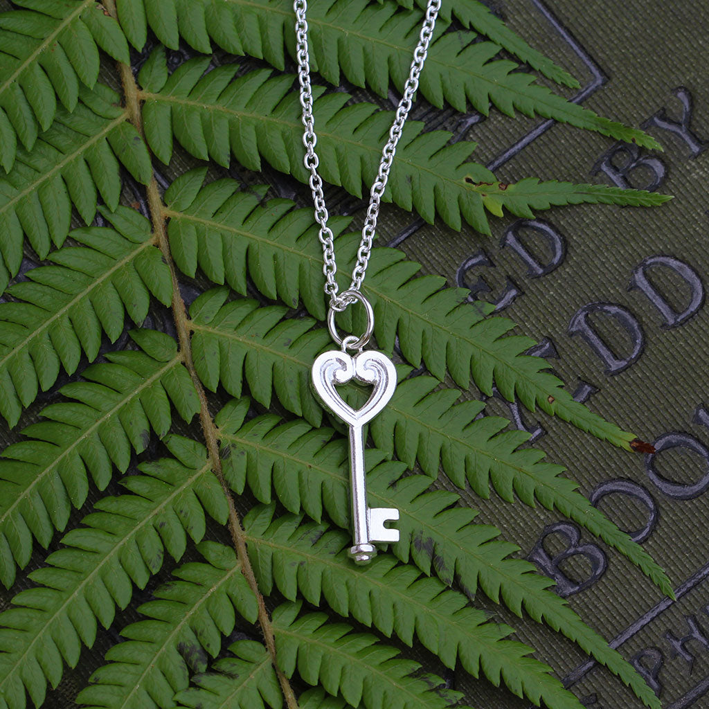 Silver koru heart key necklace