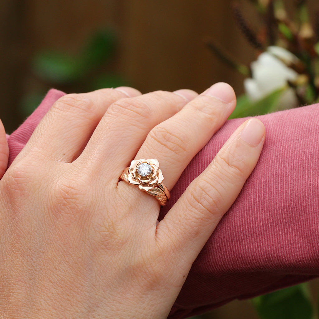 Rose ring with a diamond and a leaf ring