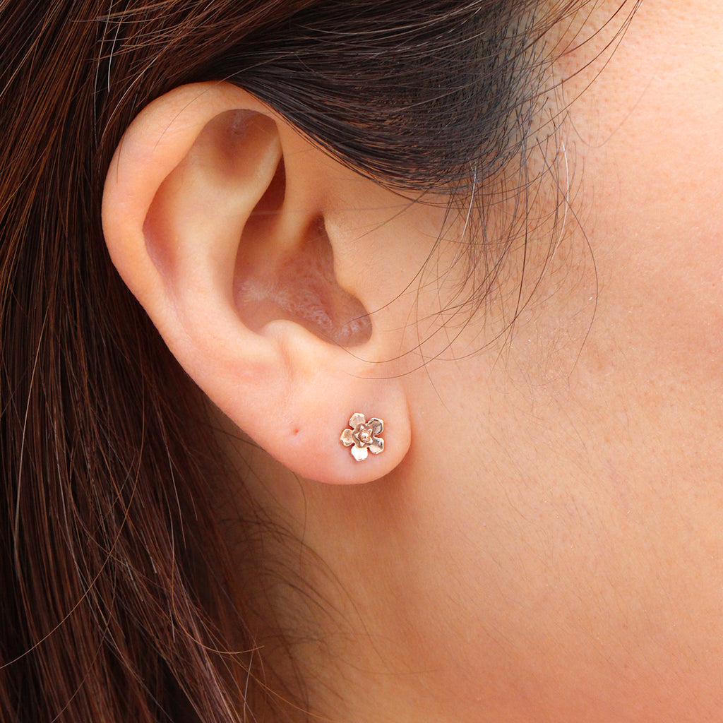 Small rose gold forget me not flower earrings