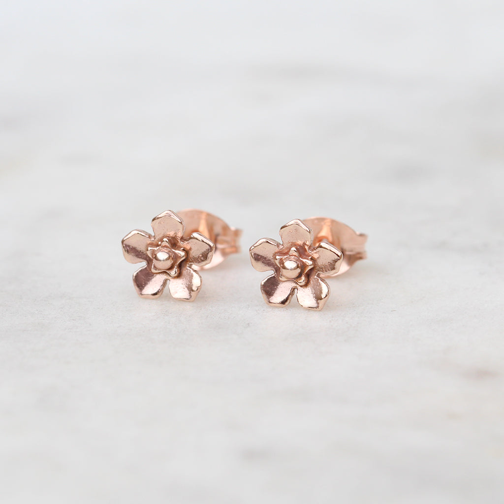 Small rose gold forget me not earrings