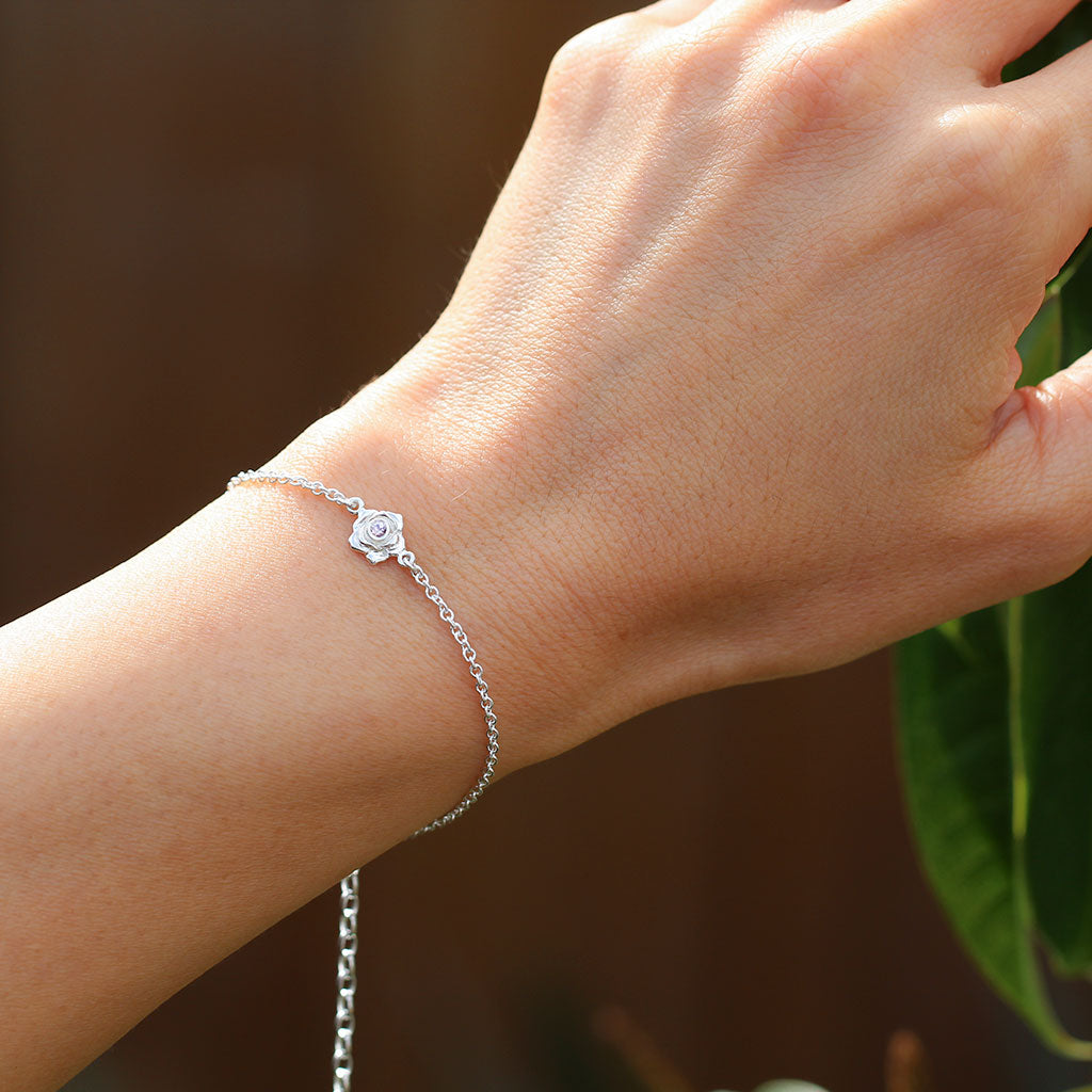 Mini rose silver bracelet with a pink sapphire