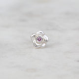 Silver rose stud with a pink sapphire