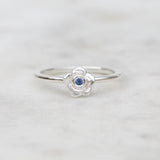Silver rose ring with a Ceylon blue sapphire