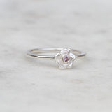 Rose ring with a pink sapphire in sterling silver
