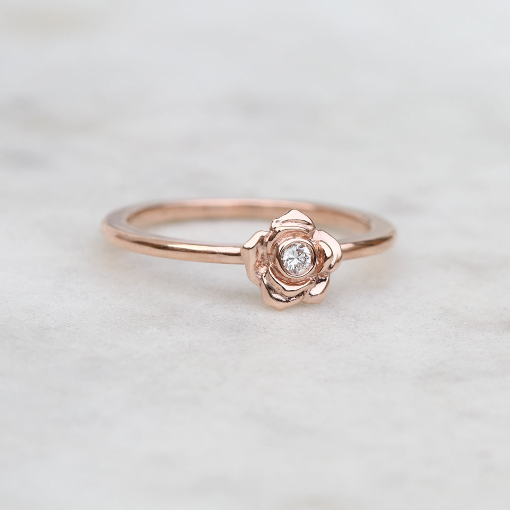 rose ring with a diamond in rose gold