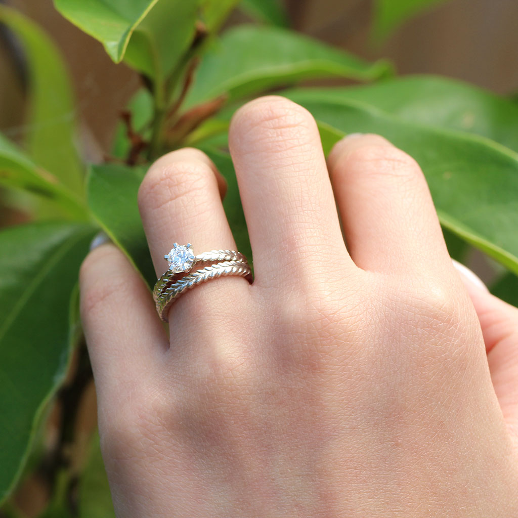 Silver fern engagement ring and silver fern wedding ring