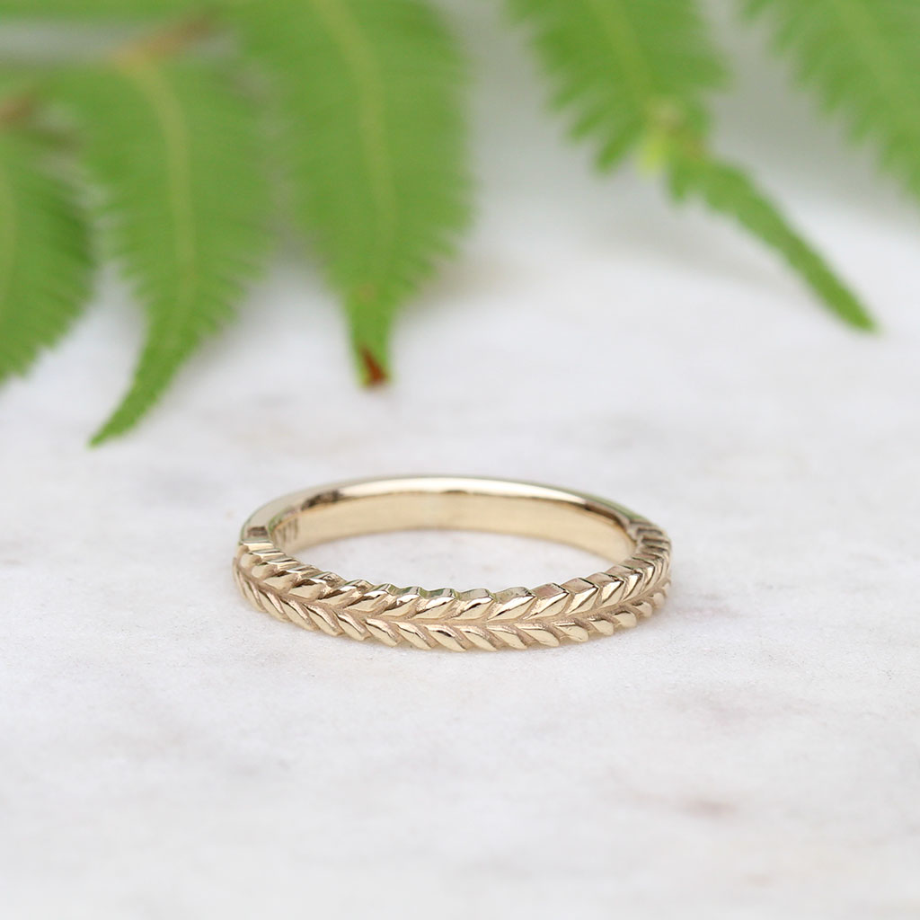 Silver fern wedding ring in goild