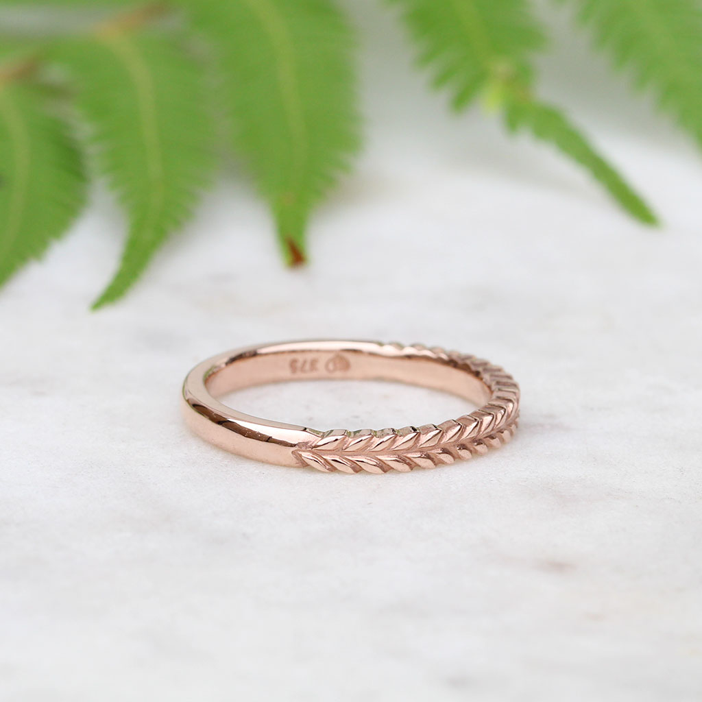 Silver fern wedding ring in rose gold