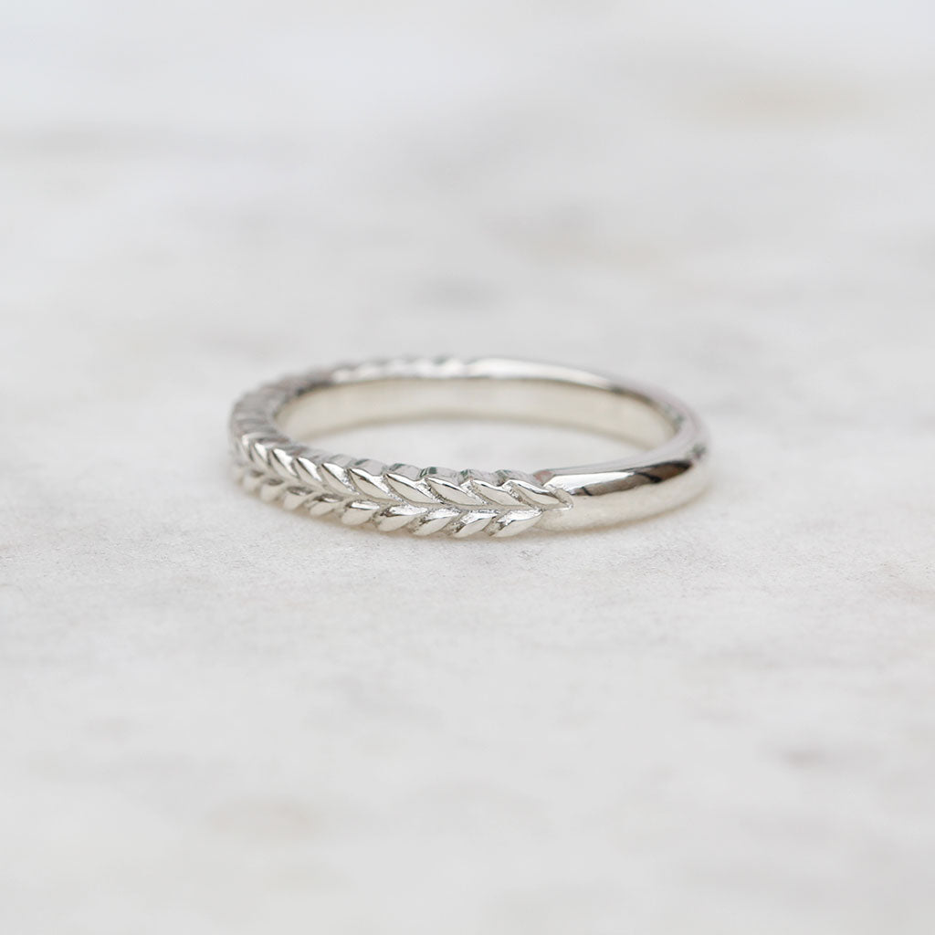 Silver fern wedding ring in white gold