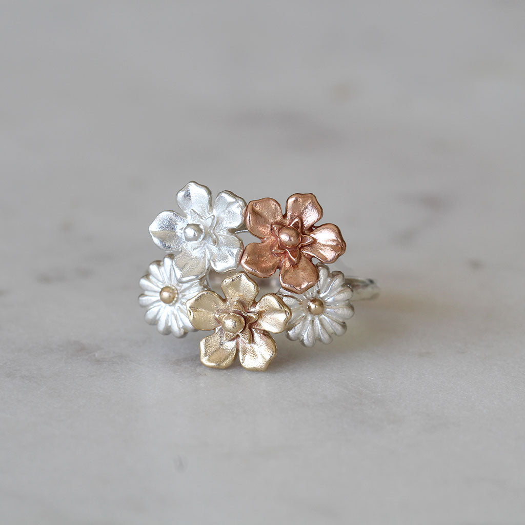 flower bouquet ring in gold, rose gold and silver