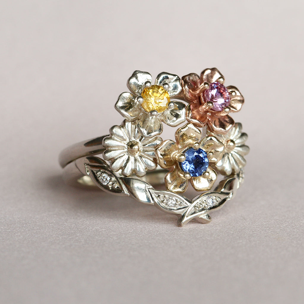 flower bouquet wedding ring and olive leaf wedding ring