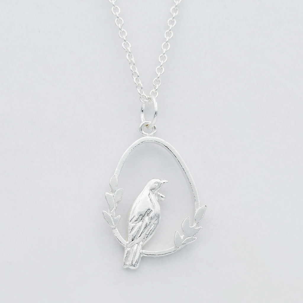 silver tui bird necklace