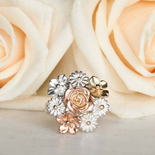 big flower bouquet ring in gold and silver