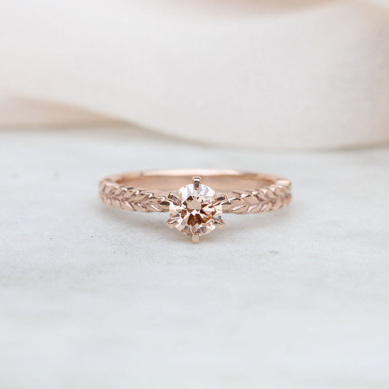 Rose gold silver fern ring with a lab-grown pink diamond
