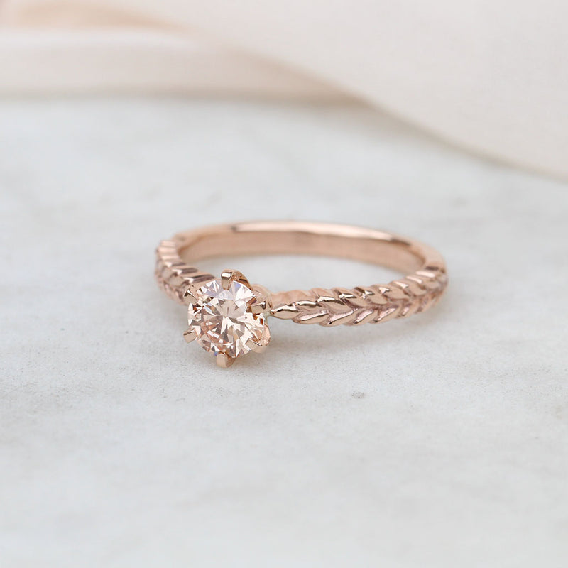 Silver fern engagement ring with a lab-grown pink diamond