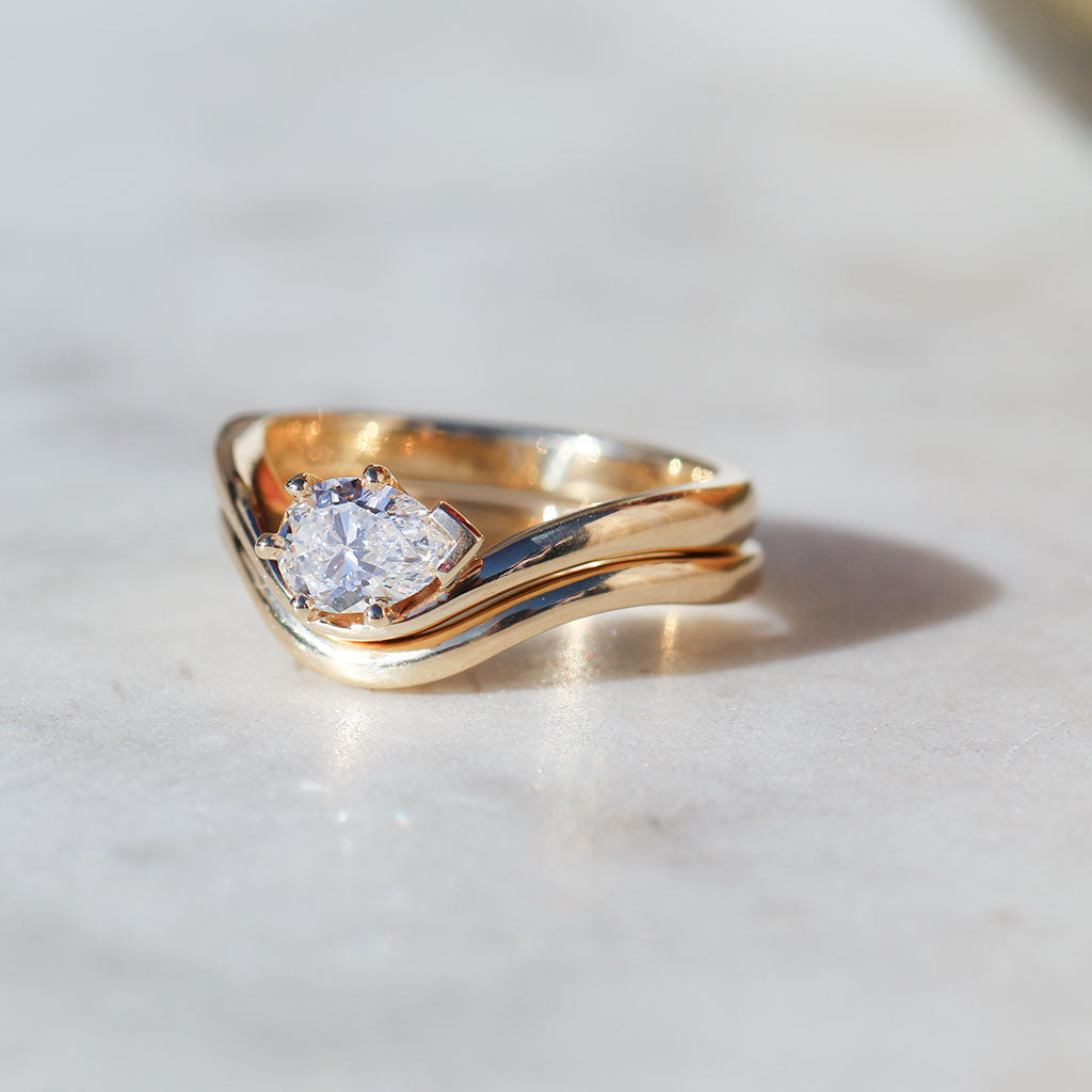 Flow engagement and wedding ring set