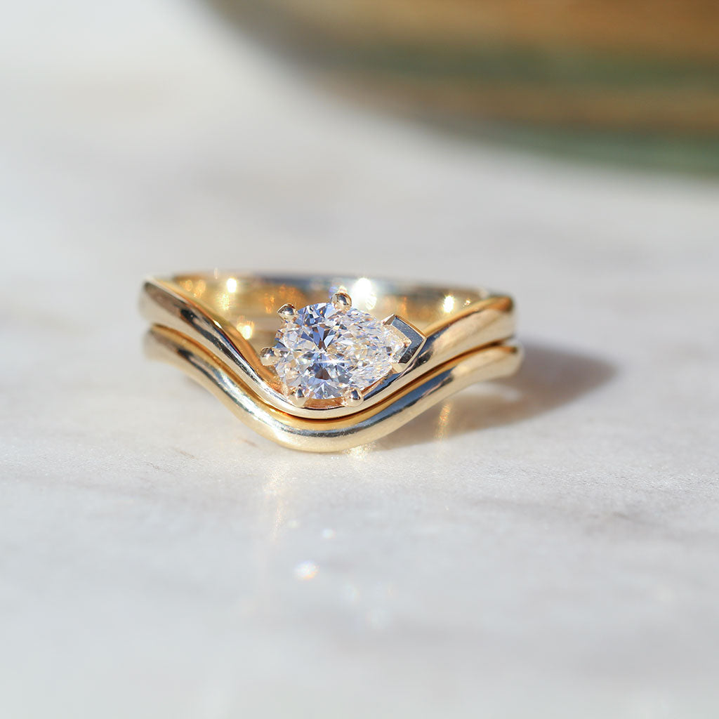 Flow engagement ring and wedding band