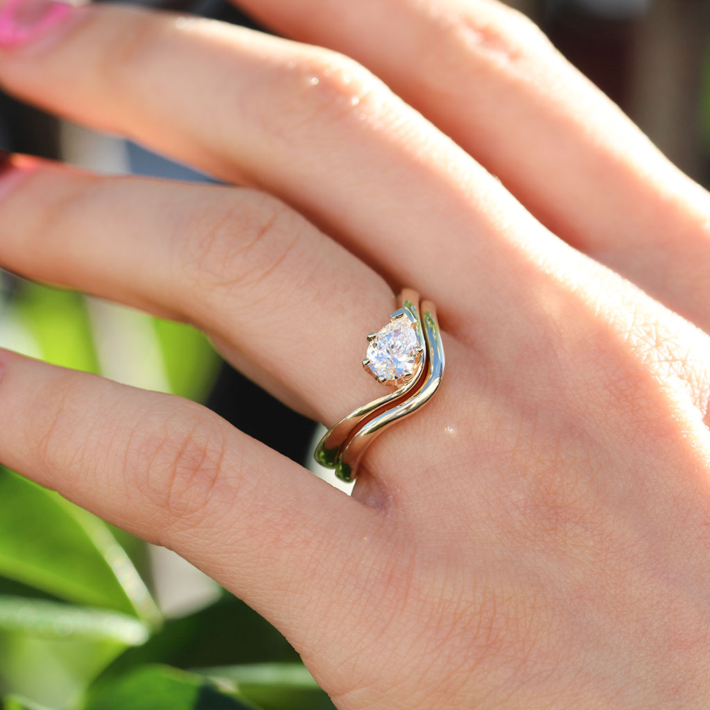 Flow engagement ring and wedding ring