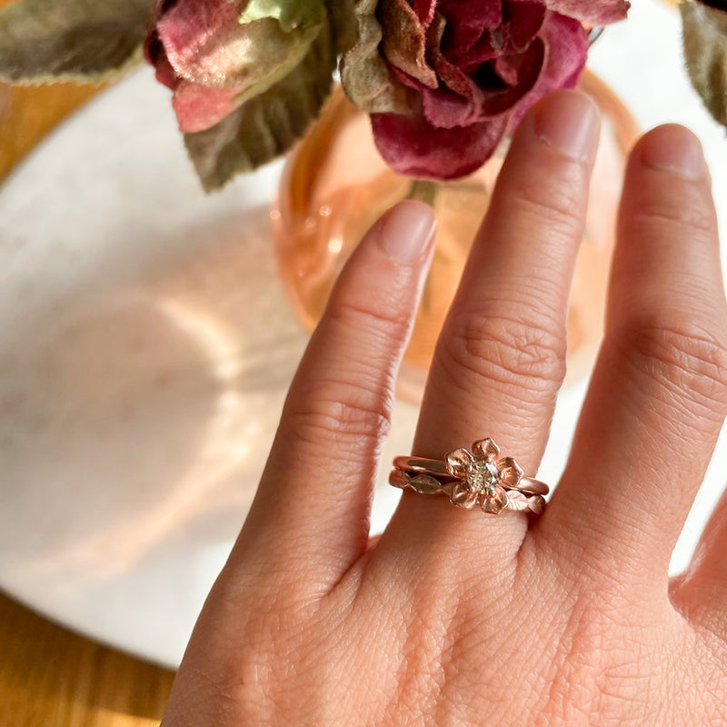 forget me not flower engagement ring in rose gold