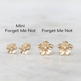 Gold forget me not earrings size comparison