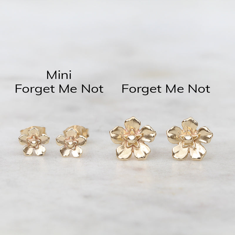 Gold forget me not earrings size comparison