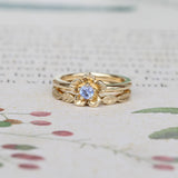 forget me not sapphire engagement ring and leaf wedding ring