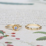 forget me not engagement ring and leaf wedding band