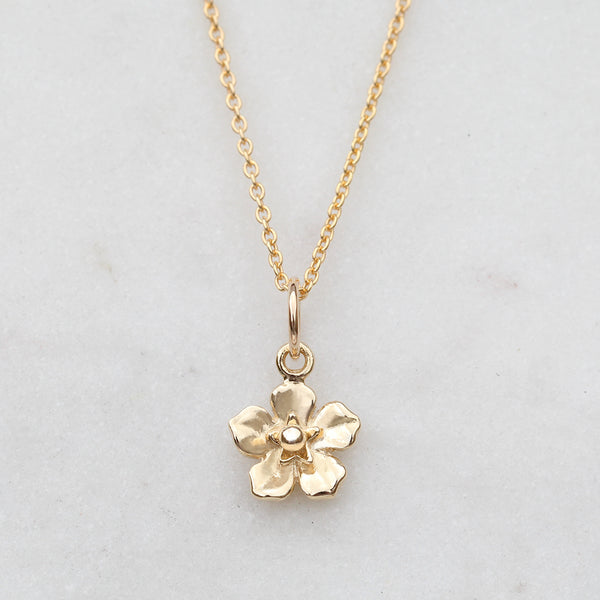 Gold forget me not flower necklace