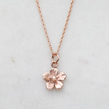 Rose gold forget me not flower necklace
