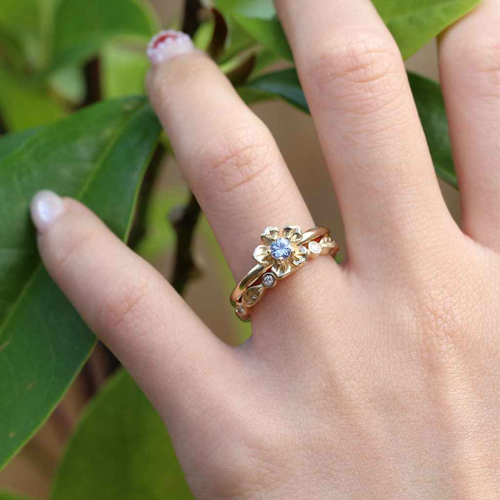 Forget me not flower sapphire engagement ring and diamond leaf wedding ring