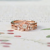forget me not flower engagement ring with a diamond leaf wedding band