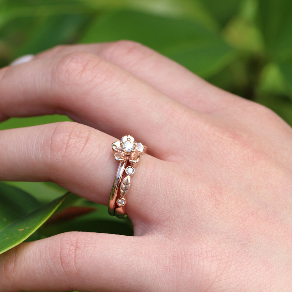 Forget me not diamond engagement ring and diamond leaf wedding ring