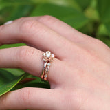 Forget me not diamond engagement ring and diamond leaf wedding ring