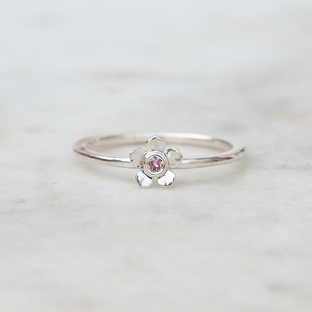Forget me not flower ring with a pink sapphire