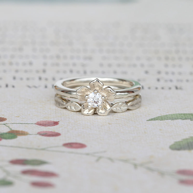 forget me not flower engagement ring and leaf wedding ring
