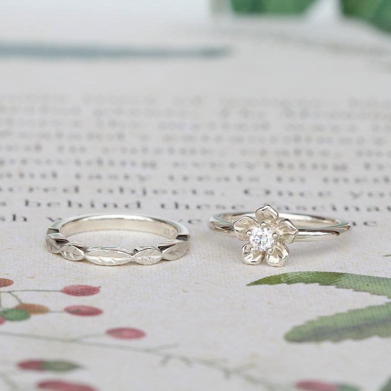 forget me not flower engagement rind and leaf wedding band