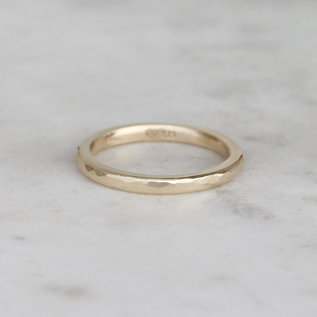 Gold hammered wedding ring